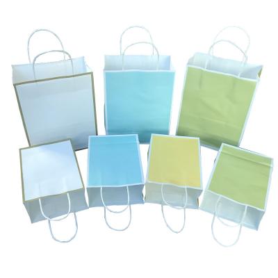 China Recycled Materials Wholesale Customized Paper Bag With Your Own Logo Printed Kraft Paper Bag With Handle for sale