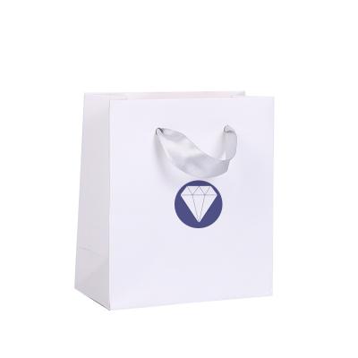 China Manufacturer Custom Logo Luxury Jewelry Paper Bag Recyclable Portable White Paper Bag With Handle for sale