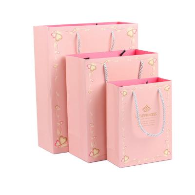 China Recyclable Hot Sale Sturdy Customized Paper Bags For Girl Lamination Paper Bag With Your Own Logo for sale