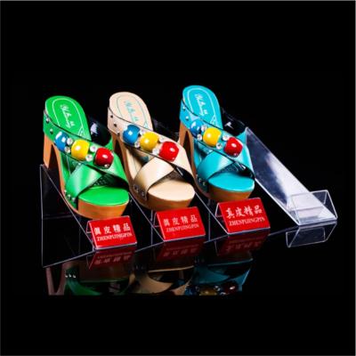 China Good Quality Plastic Acrylic Bamboo 4 Tier Rack Magnetic Levitation Shoe Display Rack for sale