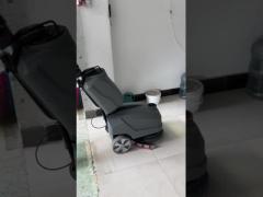 Compact floor scrubber easily cleans tile floors