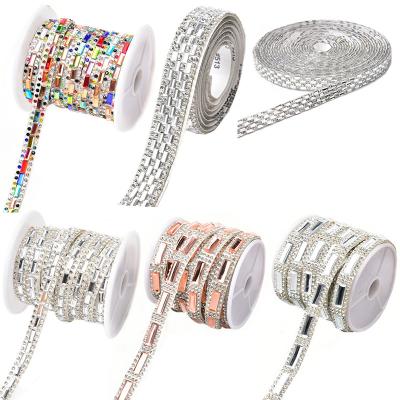 China Shinning Self Adhesive Crystal Trim White Hot Fix Rhinestone Roll Decoration Strip for sale