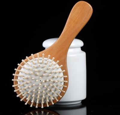 China EXFOLIATE Round Octopus Massage Comb Wooden Paddle Brush Massage Comb for sale