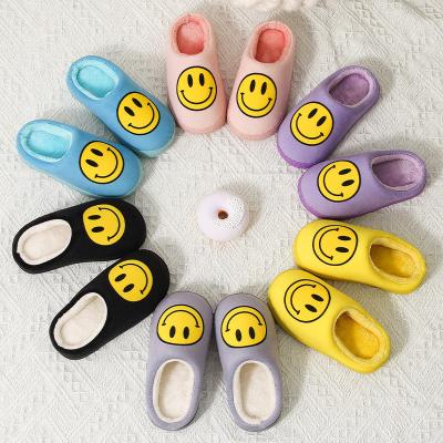 China Deodorization Smile Face Plush Warm Soft Heated Indoor Children's Slippers Faux Fur Bedroom Slippers High Quality Winter Warm Slippers for sale