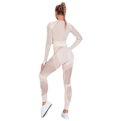 China 2021 European and American Fitness Seamless Suit Yoga Four-Way Stretch Two-Piece Set Pants 2 Piece Women Yoga Suit OEM Gym Yoga Clothes for sale