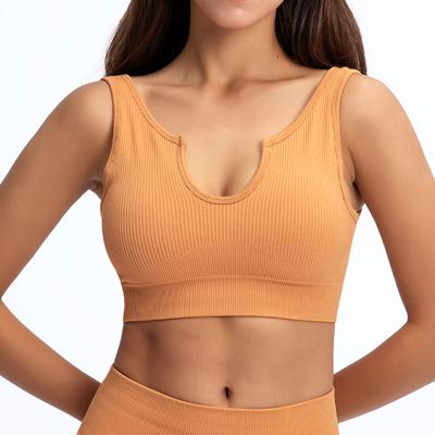 China Sweat-Wicking Best Sell Seamless Knitted Shockproof Yoga Sports Bras For Women High Print Yoga Vest U-Neck Bra for sale