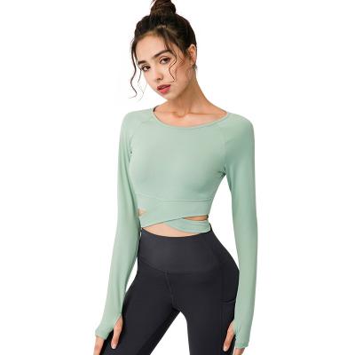 China New sweat-Wicking long-sleeved slim female sports autumn and winter running fitness tops with chest protection yoga clothes for sale