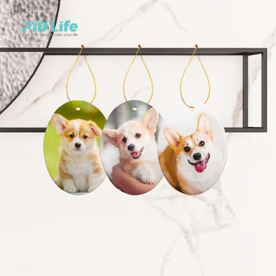 China Wholesale Christmas Tree Decoration DIY Sublimation Photo PYD Life Oval Ceramic Ornament Bauble Masks 2021 White Christmas Ornaments for sale