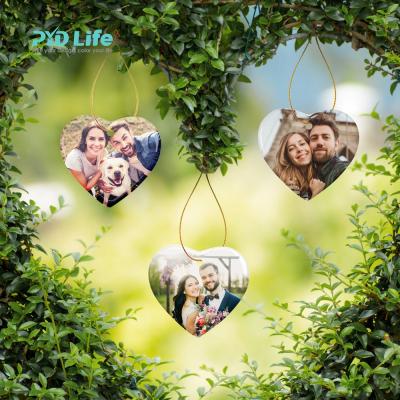 China 2021 Blank Sublimation Christmas Life Photo PYD DIY Sublimation Christmas Tree Bauble Heart Ceramic Ornaments Wholesale Sublimation for sale