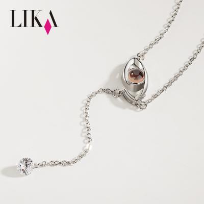 China Trendy LIKA 100 Different Languages ​​I Love You Fashion Eye Shape Zircon Projection Necklace Pendent Jewelry for sale