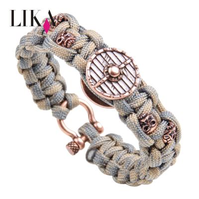 China Metal Clasp LIKA Man Fashion Rope Sparta Alloy Shield Charm Survival Paracord Bracelet Weaving Men for sale