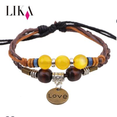 China LIKA Bracelet Friendship Style Wax Bead Leather Crystal Charm Woven Braided Leather Bracelet With Metal Engraved Lovers for sale