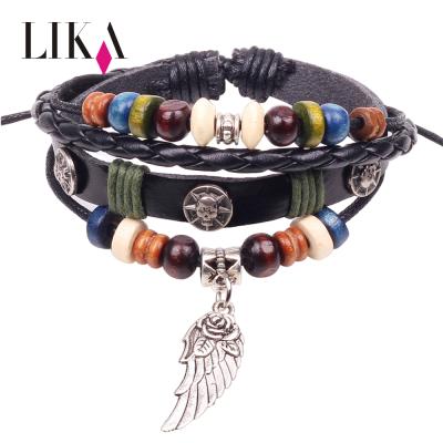 China Cheap adjustable pearl woven leather bracelet in pearl bracelet LIKA prices charm resin leather bracelet with wing pendant for sale