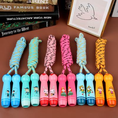 China Wholesale Customized Durable Adjustable Wooden Handle Kids Jumping Rope For Heart With Cotton Rope for sale