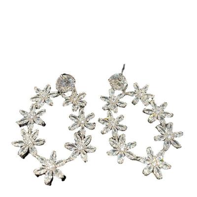 China TRENDY silver needle confetti flower earrings temperament fashion girls earrings studs wholesale for sale