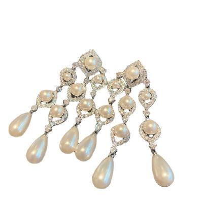 China FASHIONABLE French Stylish Atmospheric Drop Earrings Pearl Inset Micro Zircon Stud Earrings For Girls for sale