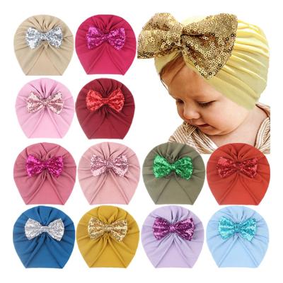 China Newborn Baby Hair Accessories Toddler Turban Beanie Cap Elastic Headbands Infant Baby Bling Bowknot Sequins Baby Hat Multifunctional Cotton for sale