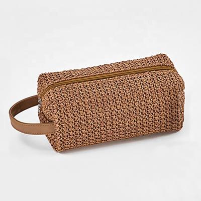 China New next high quality women's cosmetic simple portable straw bag women's fashion straw 2021 fashion cosmetic bag ladies pouch toiletry bag makeup for sale