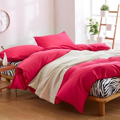 China Disposable Stock Microfiber Rose Pink Color Bed Sheet Solid Sets Polyester Bedding Textile Sets for sale