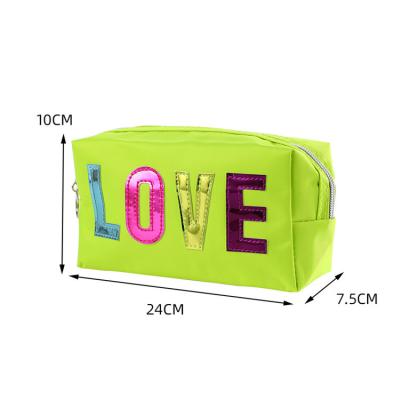 China Hot Selling Portable Fashion Korean Style PVC Candy Color Large Capacity Make Up Cosmetic Storage Bag for sale