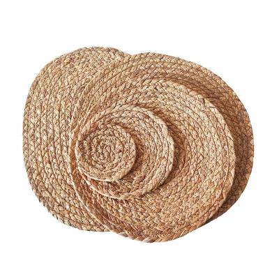 China Viable New Style Rattan Cup Coasters Surround Kitchen Dining Table Runner Woven Heat Straw Placemats for sale