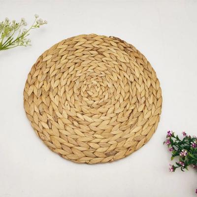 China Sustainable Art Table Decor Environmental Natural Traditional Hand Crafted Woven Round Vietnam Water Hyacinth Placemat for sale