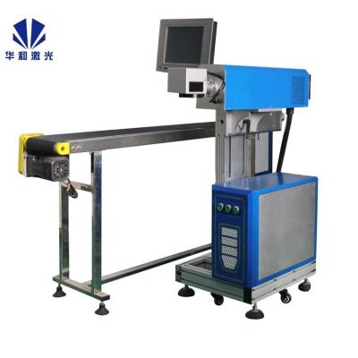 China Laser Marking High Selling CO2 Flight Meter Laser Engraving Machine For Fabric Leather Clothing Goods Good Return for sale