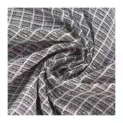 China New autumn and winter plaid tweed fabric stock tweed fabric wrinkle resistant high quality tweed fabric for sale