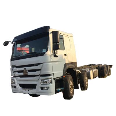 China heavy duty sinotruk transporter 8x4 flatbed cargo Lorry Truck Chassis for sale 11963x2496x3450 for sale