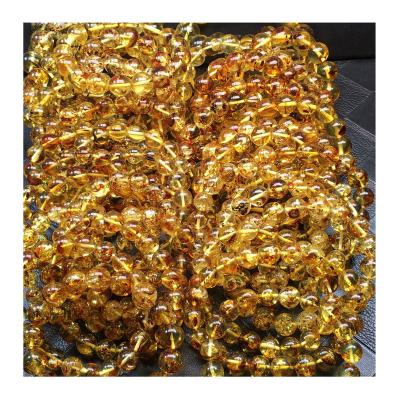 China Factory outlet high grade yellow natural baltic amber yellow and white amber bracelet amber flowers are crystal clear for sale