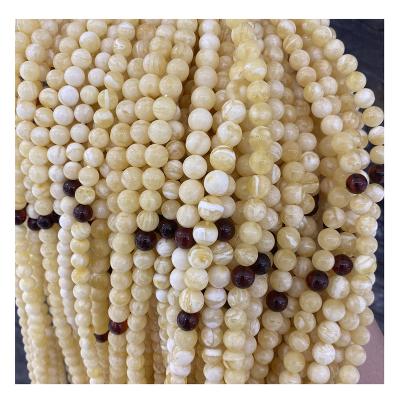 China High Quality Polishing Russian Amber Beads The Factory Outlet Natural Baltic Amber White Amber Bead Factory Outlet Diameter Is 8-10mm for sale