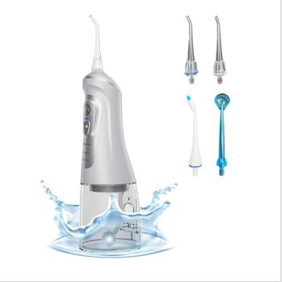 China 2021 Portable Home Use Waterproof Oral Electric Tooth Irrigator Portable Electric Cleaner for sale