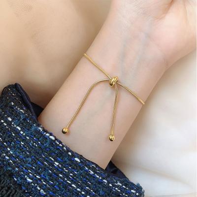 China skin-friendly & eco-friendly bulk 18K gold plated stainless steel adjustable round snake chain slider bracelet for women for sale