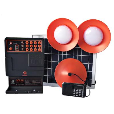 China Jua Energy Home SQUARE Pay As You Go Mini Solar Home Lighting System Paygo Solar Powered Home System with 4 Lights for Rural for sale