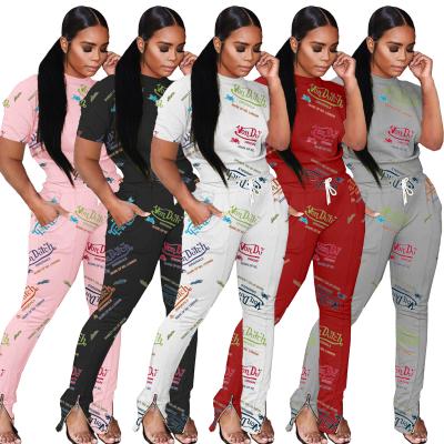 China QUICK DRY no minimum with you graffiti fashion polyester short sleeve drop 2 piece sets womens tracksuit suits and tuxedo women sets for sale