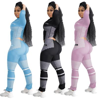 China 2021 QUICK DRY hot sale 2 piece fashion polyester zipper set long sleeve streetwear workout clothing women set for sale