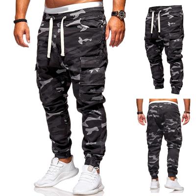 China 2021 best selling Anti-wrinkle celana fashion polyester green camouflage stacked cargo jogger pants set men for sale