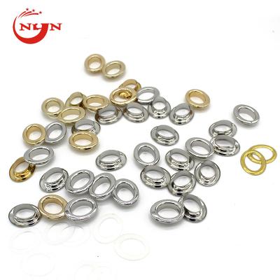 China Fashion Nickel Free Flat Face Shape Iron Oval Grommet and Grommet for sale