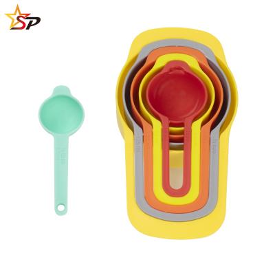 China 6pcs Measuring Cups Viable Rainbow Colors Measuring Cup Adjustable Colorful Baking Set for sale