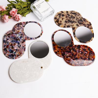 China Custom Acetate Makeup Mirror Woman Small Folding Mirror Gift Lighted Round Mirror for sale