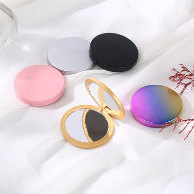 China Customized Custom Logo Simple Small Mirror Folding Round Mirrors Makeup Customized Portable Color Double Sided Folding Mirror for sale