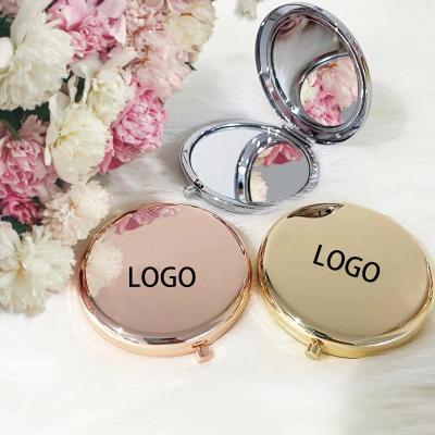 China Portable Double Sided Metal Makeup Hand Mirror Round Mini Pocket Mirror Rose Gold Contract Mirror for sale