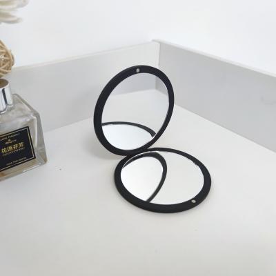 China Good Price Magnifying Soft Touch Coating Travel Folding Slim Double Side Mirror for sale