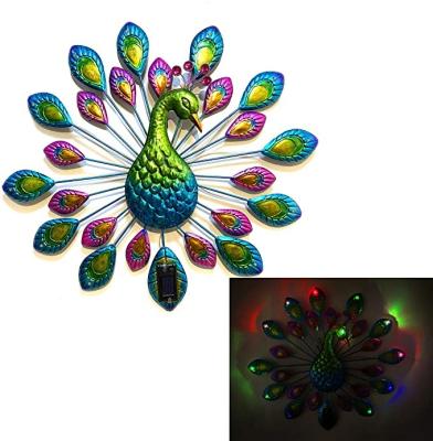 China Wall Hanging Art Indoor Outdoor Decoration Peacock Statue Peacock Art Decor Solar Metal Wall for sale