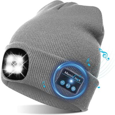 China JOINT Adjustable Shine Winter Beanie Cap Knitted Headlamp Hat With With Removable Earpiece for sale