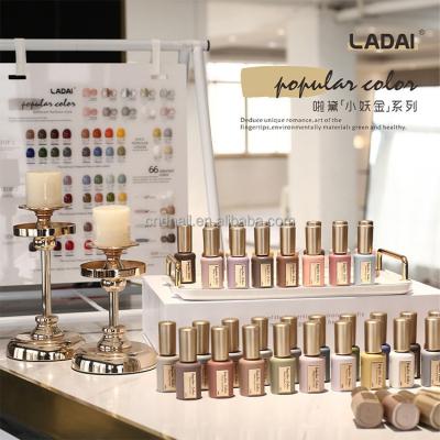 China Nail Art Beauty The new Oberli Ladai small demon gold 66 colors a bottle of one-color nail shop costume special glue for sale