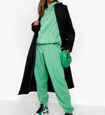 China Breathable Green Hooded Drawstrings Sweatsuit With Pockets Custom Kangaroo Female Tracksuits for sale