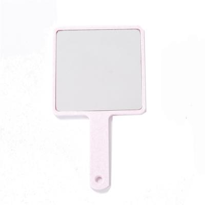 China 2022 Eco-friendly Degradable Cosmetic Hand Mirror Amazon Pocket Wheat Straw Pocket Mini High Quality Single Sided Small With Handle for sale