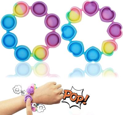 China Environmental Special Needs Stress Reliever Silicone Squeeze Wristbands Push Up Noise Bubble Restless Person Wristband Toy for sale