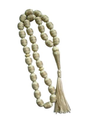 China Formal Gold Plated Oval Muslim Prayer Beads 33 Tasbiha Islamic Prayer Beads for sale